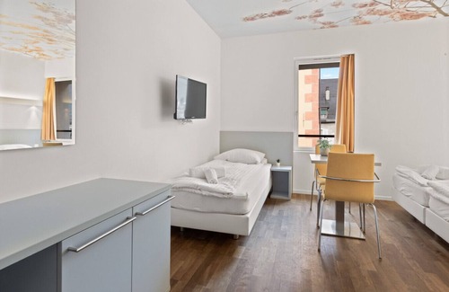 Sierre Hotel | Magnificent triple room in the heart of Sierre