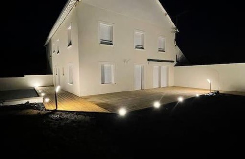 Carpiquet House | Maison au sein d’un corps de ferme.