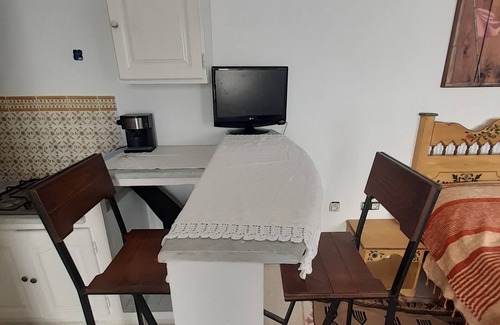 Borj Erras House | Maison d'hôte Albatros Guest room with private bathroom and court view