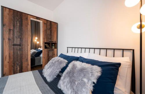 Baluty Apartment | Manufaktura Residence - Apartamenty Industrial z Parkingiem i Dwoma Łazienkami