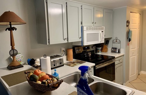 Point East Condo | Master Suite KING SIZE BED, Guest bedroom two FULL SIZE beds. Family discounts.
