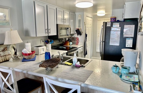 Point East Condo | Master suite KING SIZE bed, Guest Bedroom two FULL SIZE beds. BIG Discounts!