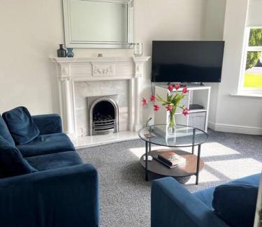 East Kilbride House | Meadow House- Driveway Parking and Fireplace