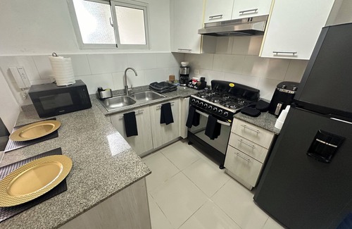Mendoza Apartment | MhiRosse 1 centrally located in Santo Domingo Este.
