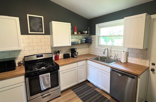 Miller Beach House | Mid Century Miller Beach House near Indiana Dunes with game room and fire pit.