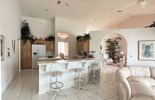 Naples House | Million dollar lake views; 4-bed 3 bath pool house- Old World Charm in Naples FL