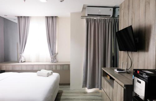 Pondok Aren Apartment | Minimalist Studio Room at Bintaro Icon Apartment By Travelio
