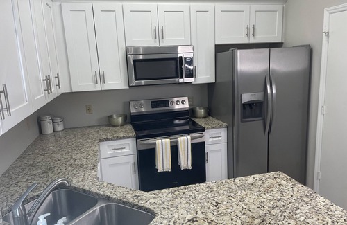 Charlotte House | Minutes from UNCC, this pristine, single-level home is perfect for family fun!