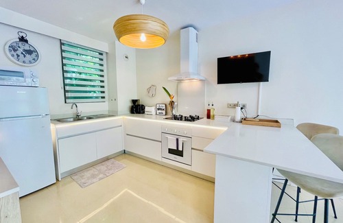 Punaauia Condo | Miri Coconut, 1 bdr flat with pool in a calm area near the sea and town