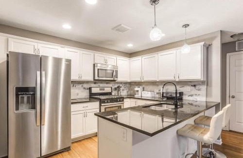 Lowry Hill East House | Modern 3 Bed 3 Bath Condo in Uptown