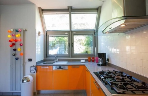 Suna Villa | Modern 4½-room terraced corner house with sauna, garden and gigantic lake view