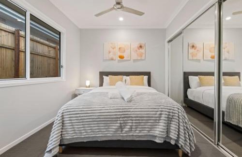 Logan Reserve House | Modern 4BR Home Peaceful Logan Reserve Stay