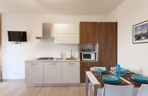 Cassone Apartment | Modern Apartment "Gennaker" On Lakeside with Terrace and View