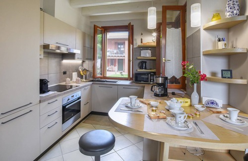 Pozzolengo Apartment | Modern apartment with large pool and garden.