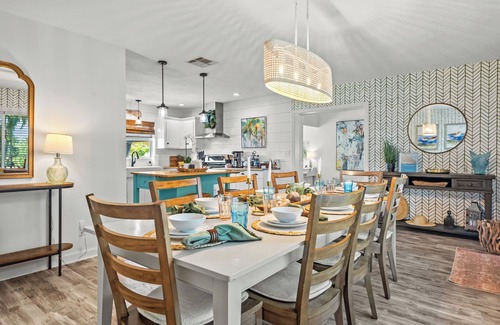 Stuart House | Modern coastal getaway with hot tub, putting green and private backyard oasis.