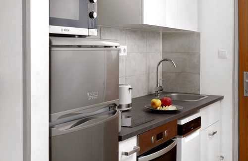 Corvin negyed Apartment | Modern, elegant downtown apartment offers 5-star hotel quality luxury bedding