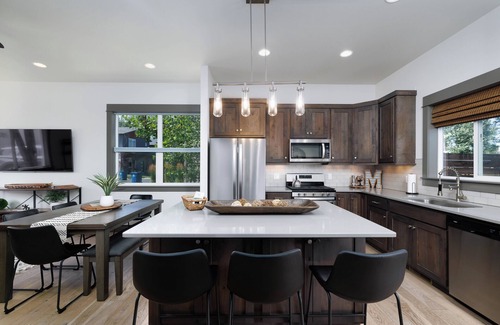 Four Corners House | Modern home w/garage converted game room!