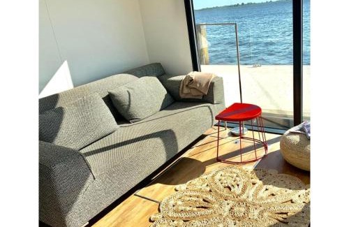 Offingawier Boat Rental | Modern houseboat in Offingawier with terrace