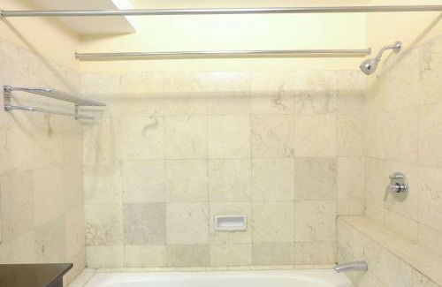 Braga Apartment | Modern Look 3BR at Apartment Braga City Walk By Travelio