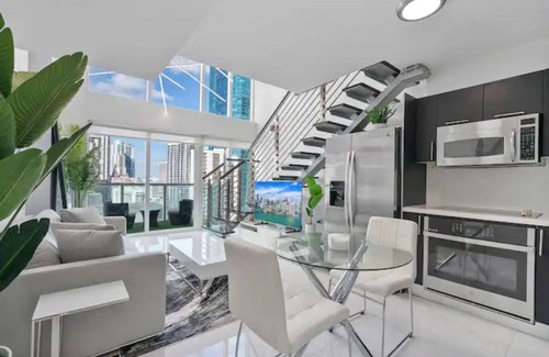 Brickell Condo | Modern luxury loft with water and city views