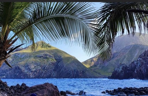 Windward Side Villa | Modern Luxury Villa in Flatlands. Pool. Walk to Beach. Sleeps 6. Ocean Views.