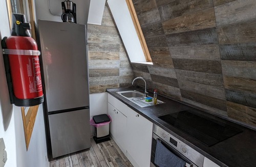 Marienfelde Apartment | Modern meets wood