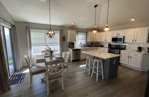 Duval House | Modern Open-Plan Home w/Updated Kitchen, Private Lanai & Golf Cart