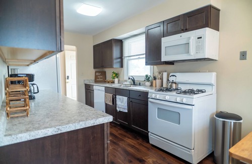 Mundelein Apartment | Modern Rooftop Retreat in Downtown Mundelein