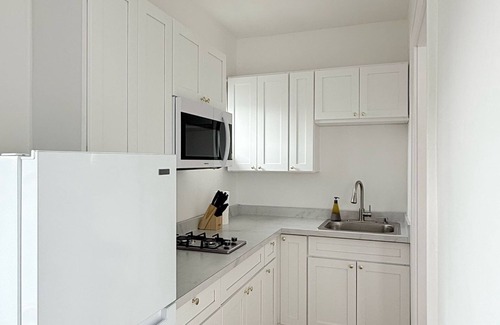 East Avenue Apartment | Modern studio in Downtown Rochester with a full kitchen and Smart TV, steps from High Falls.
