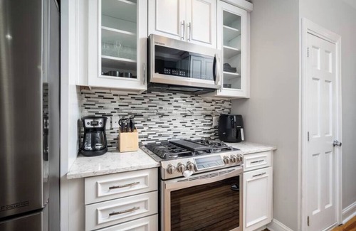 Near Northeast House | Modern Swanky Oasis Central Location FREE Parking!