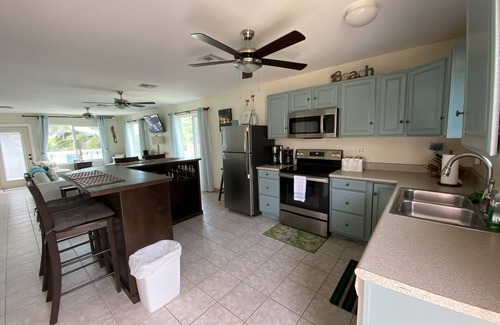 Farmer's Hill House | Modern vacation home with private yard, steps to the beach and centrally located