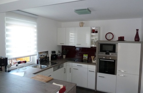 Ratekau House | Modern vacation home -fireplace-sauna-wellness-nature-Baltic Sea-quiet-3 bedrooms