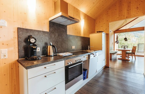 Gatschach Ski Chalet | Modern wooden chalet directly on Lake Weissensee in Carinthia incl. beach and SEE-Spa!