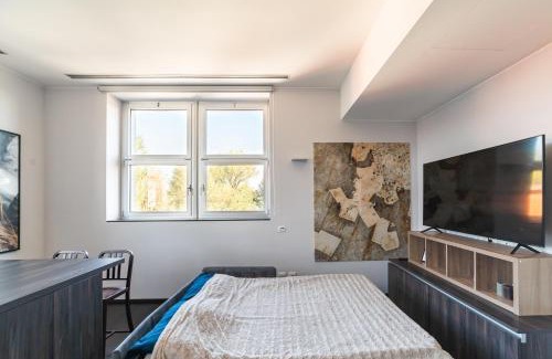 Greco Apartment | Moderno Bilocale 64mq con Parcheggio e Palestra