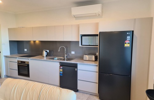 Rosetta Apartment | MONA Vista, overlooking Museum of Old and New Art (MONA) & the River Derwent.