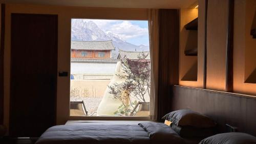 Lijiang House | More Sunshine Villa 猫在雪山下田野里民宿