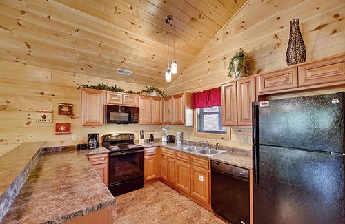 Pigeon Forge Cabin | Mountain and River Views: hot tub ~ pool table~ movie theater ~ fire pit