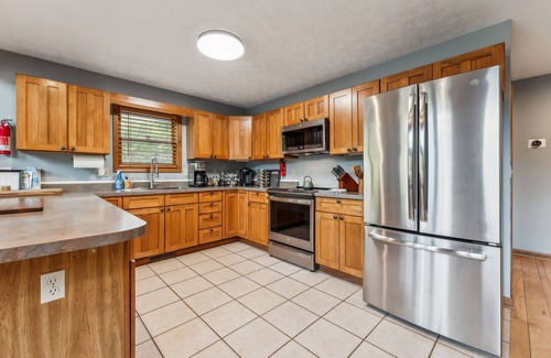 Thayerville Ski Chalet | Mountain Chalet with Hot Tub, Fireplaces, and Fire Pit