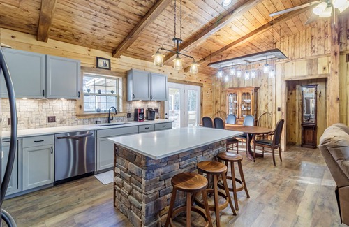 West Union Cabin | New 3 Bedroom Log Cabin nestled in the woods with one acre fishing lake .