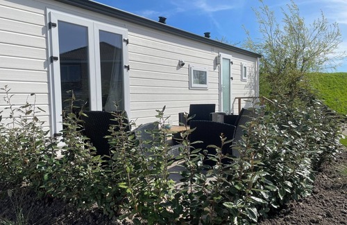 Anna Paulowna Ski Chalet | New chalet 2 on the edge of the Wadden Sea and Amstelmeer with private terrace!