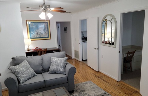 Frankfort Condo | *NEW* Condo above bakery in Downtown Frankfort w/Sunroom view of Betsie Bay!