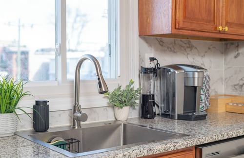 The Heights House | New! Cozy retreat w/complimentary parking and arcade game room! Minutes to NYC