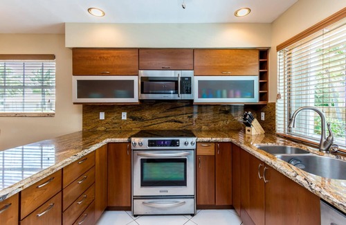 Imperial Point House | NEW| Heated Pool- Stunning Villa | Resort Style | Fenced| Private|Near Beach