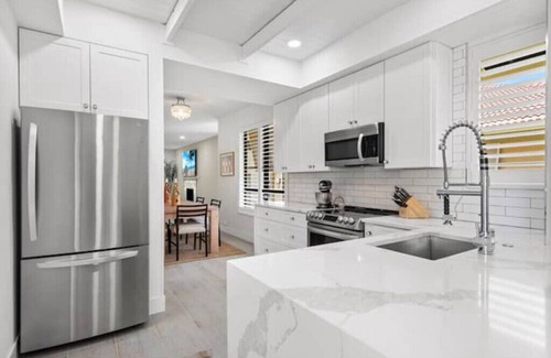 Hunt Club House | New Home at PGA National on Golf Course with Private Spa by Guaranteed Rental™