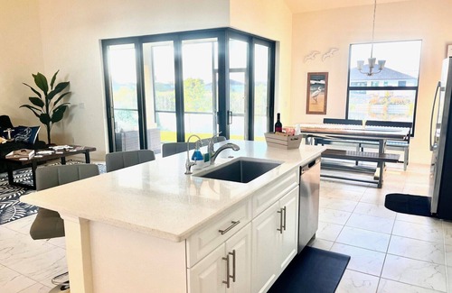 Burnt Store House | New House with Step Free Entry, Canal, Fish, Sunset Views, Near Golf & Baseball.