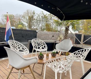 Baambrugse Zuwe Boat Rental | NEW - LITTLE IBIZA, on a lake near Amsterdam, with HOT TUB!