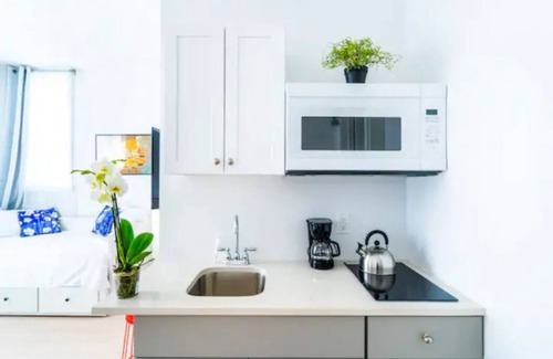 Queens Apartment | NEW! Luxury Studio! Smart Home! Main St! w/Free Parking!