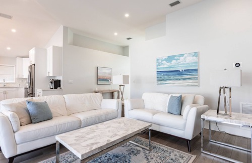 North Palm Beach Heights House | New On The Market! Newly Renovated 3BR/2BA Heated Pool & Screen Enclosure.