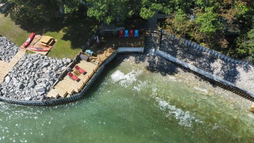 Northeastern Michigan Apartment | New! Schmidt's Cove - Amazing Private Lakefront!
