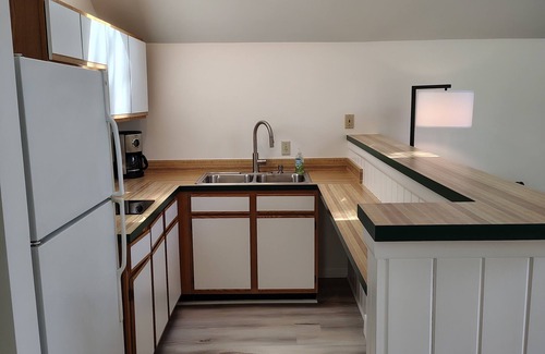Lake Leelanau Cottage | NEW! Waterfront Cottage on private Lake Michigan Beach with glorious sunsets